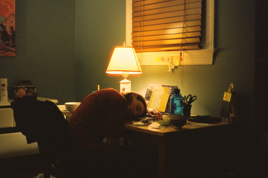 author writing at desk